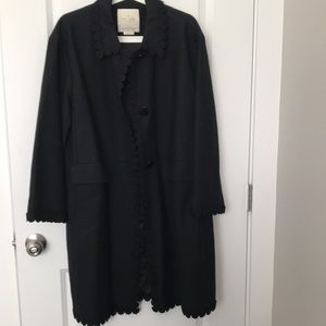 Kate Spade black long coat with floral pattern embroidered along the edge.
